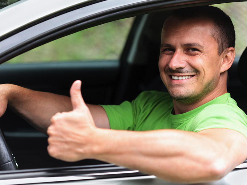 guy in his car